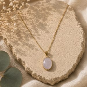 Pendentif quartz rose facetté serti de cuivre plaqué doré